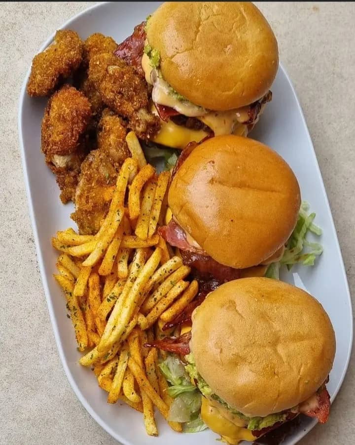 Burgers, fries and crispy chicken platter